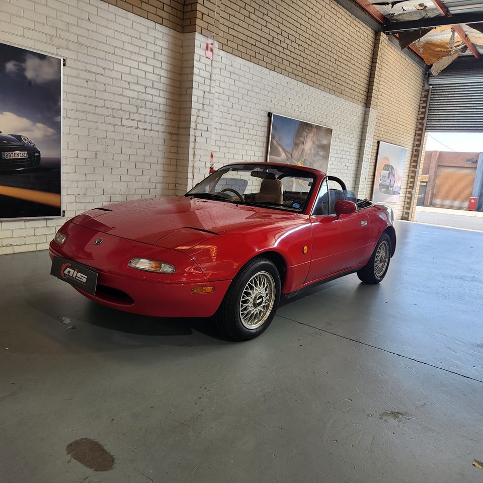 This manual MX5 is a brilliant car, but since the most current tech in there was a cassette player, this client brought it to us for what we'd almost consider a safety upgrade. The new Alpine ILX407 supports wired Carplay/Android Auto, and the USB po