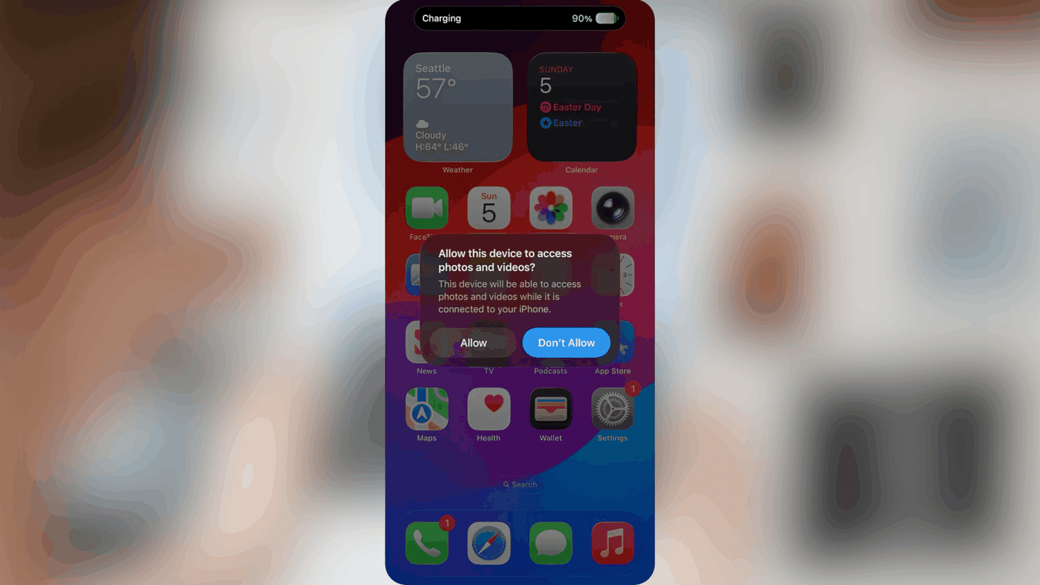 iPhone prompt confirming access to photos and videos