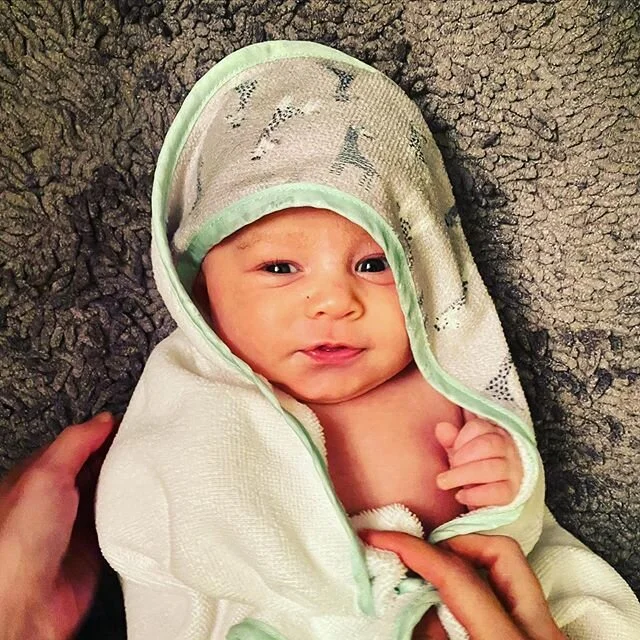 Rub-a-dub-dub chubby baby in tub.