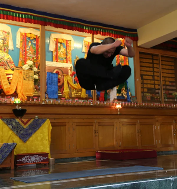 Tulku Lobsang doing the full Vajra Jump in a monastery in India.