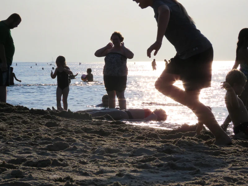 Lake Michigan beaches are crowded with families this weekend.
