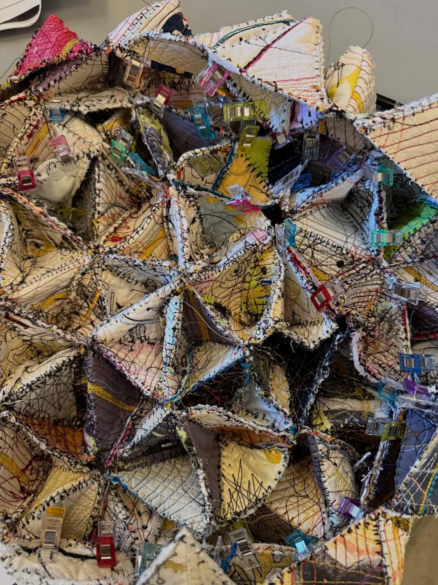 And now for some hand stitching. #triangles #fibreart #fiberart #freemotionquilting #art #sculpture