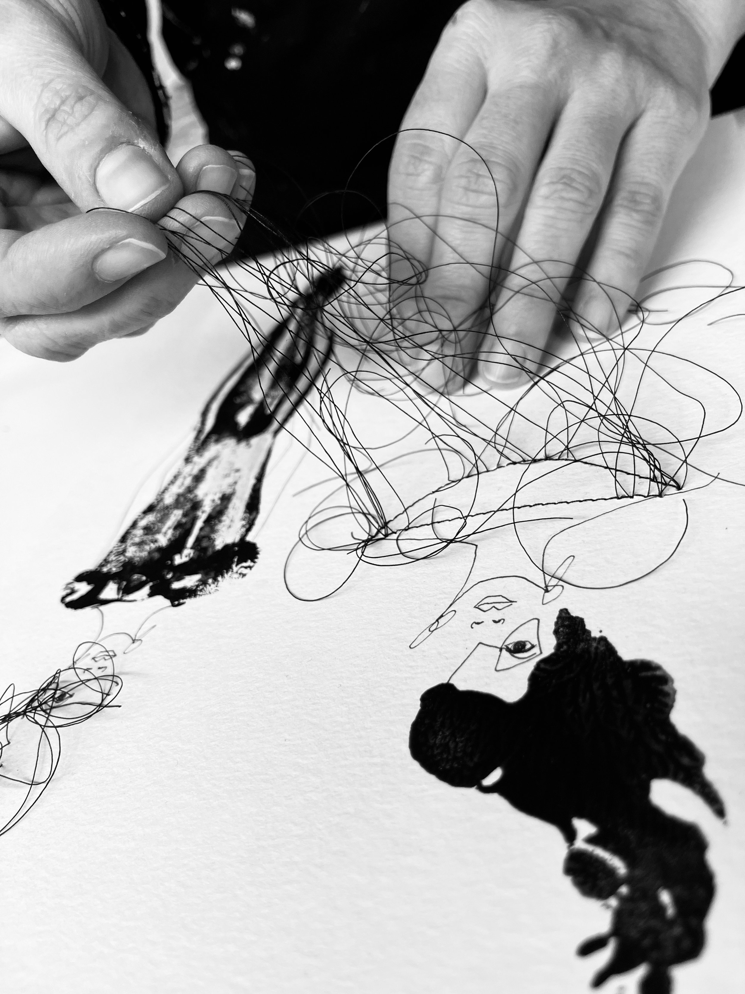 Close-up, stitching on paper, Saraha Albisser.jpeg