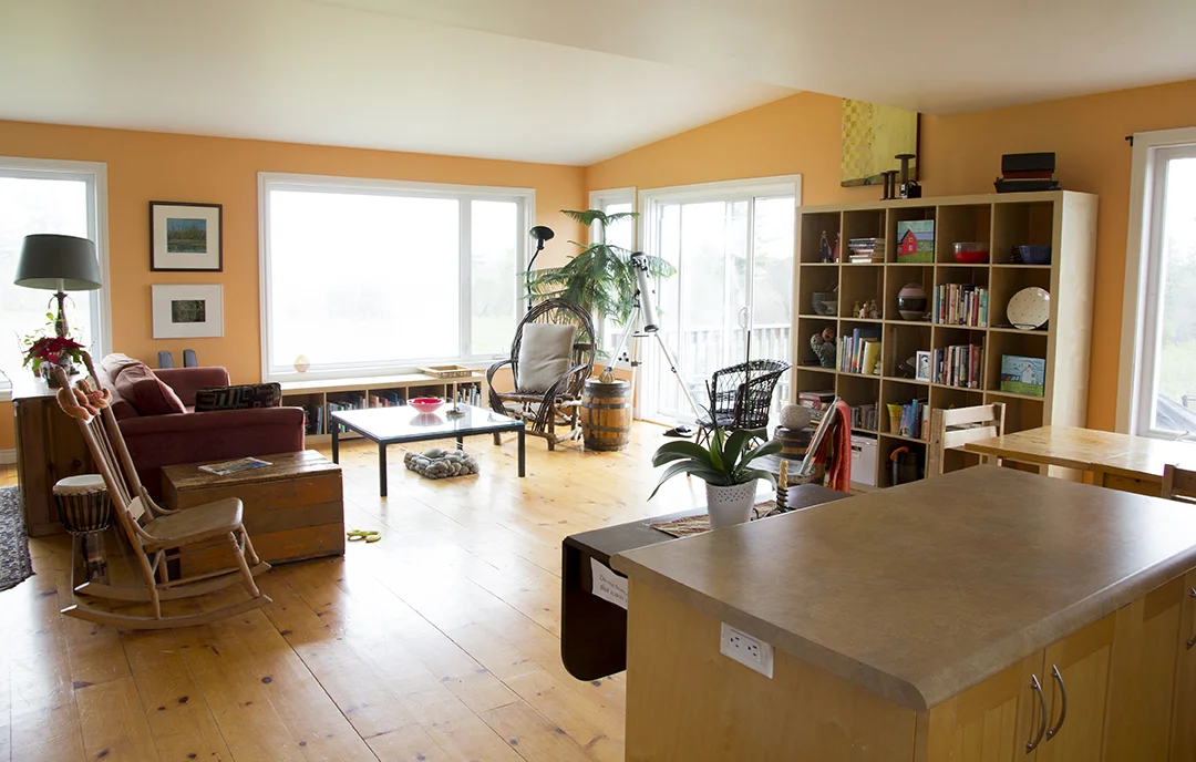 living room with sliding screen door to deck