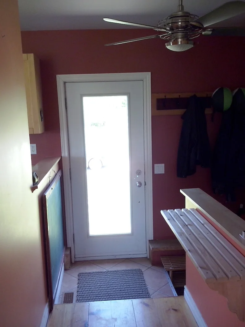 Entry (kitchen to left, stairs to basement to right)