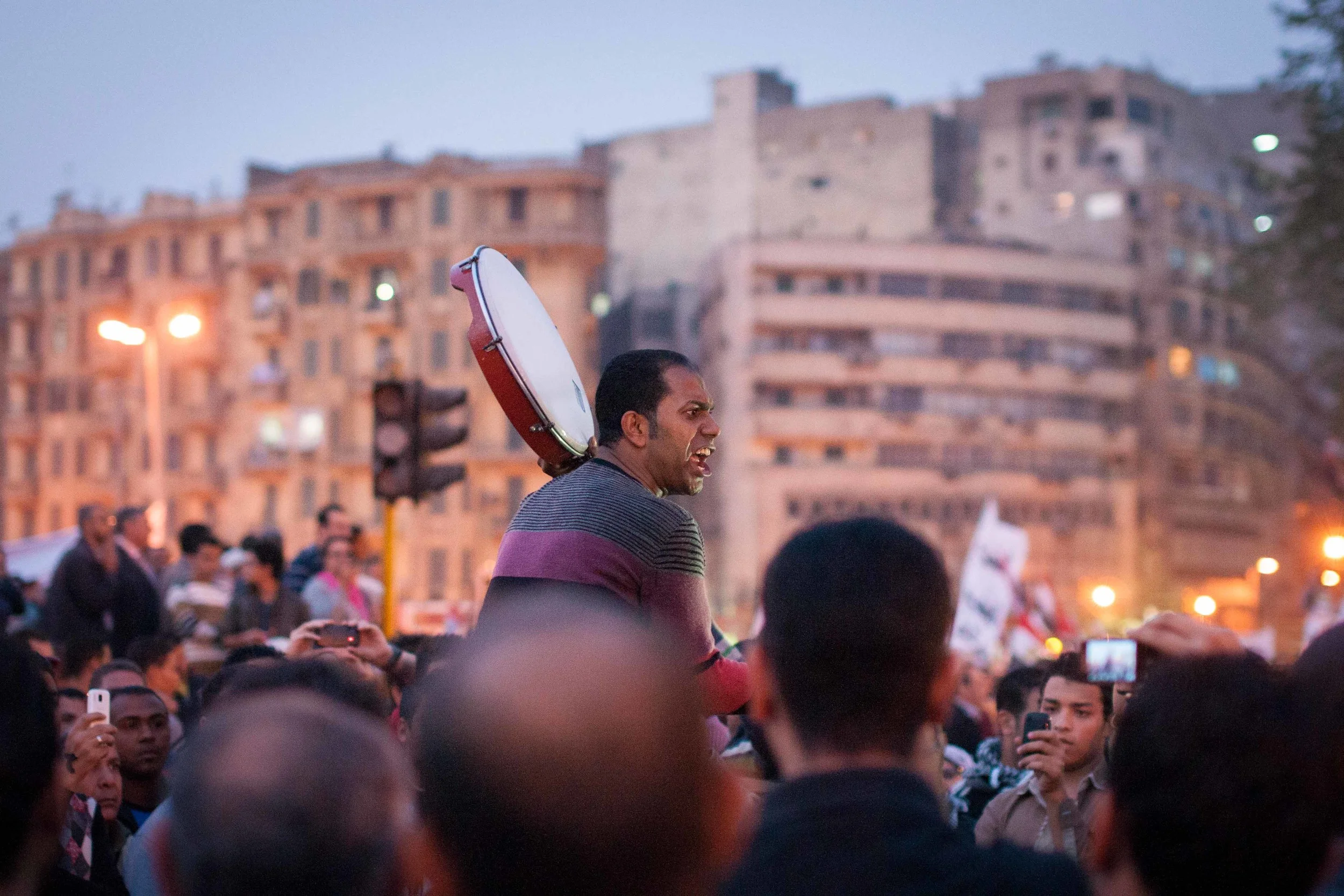 A member of the April 6th Movement (one of the early groups which helped start the Revolution) leads a chant in memory of a member who had been comatose since the beginning of the November 2012 clashes. He passed away three days ago.