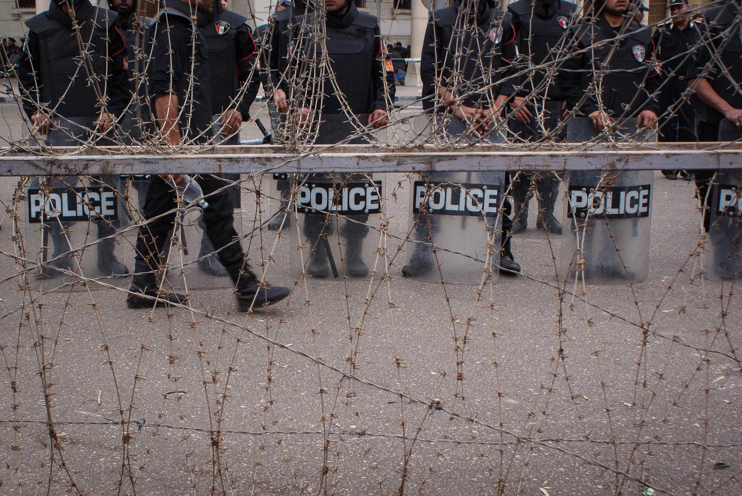 The street outside the palace was heavily guarded- until protestors breached the barbed wire.