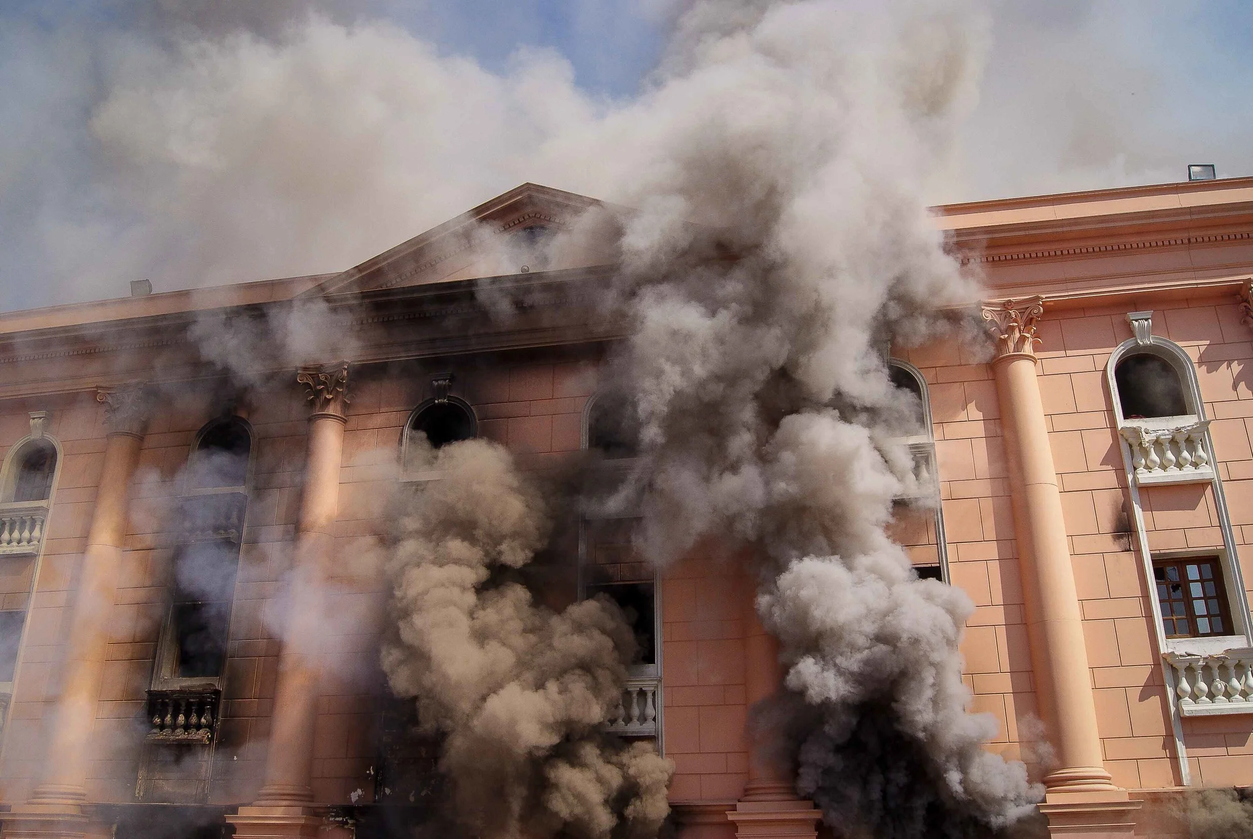 By the time we got to the Police Club, the fires were already raging inside.