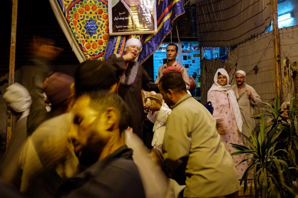 Sufi dancers twirl to the beat of the drums.