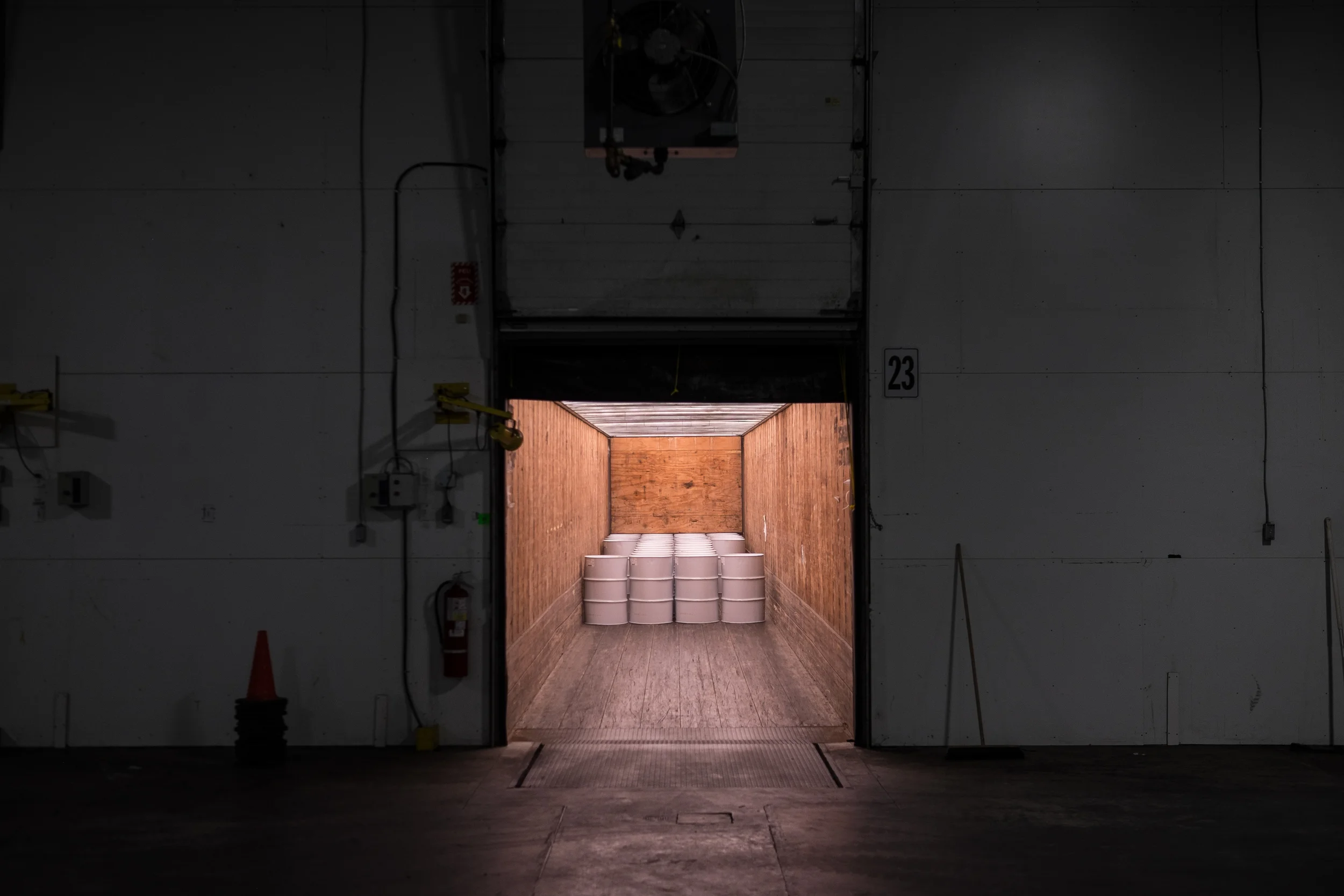 Barrels are loaded into delivery trucks at the Federation of Quebec Maple Syrup Producers Global Strategic Reserve. Leyland Cecco/Al Jazeera America