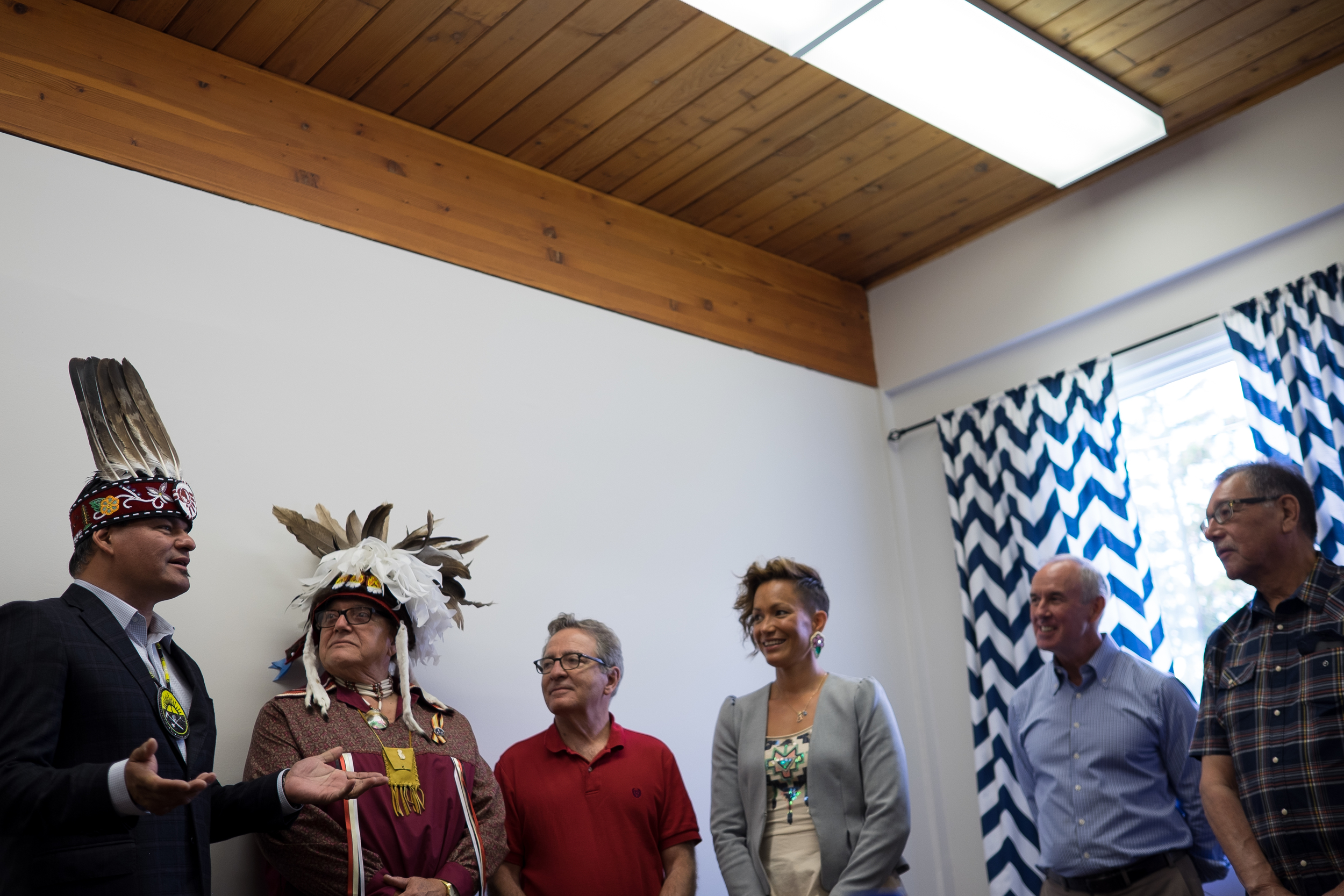 Ontario Regional Chief Isidore Day (left) speaks with New Credit Chief Brian LaForme, Minister George Zimmer, Waneek Horn-Miller, Ron McLean and Bill Chippeway about the journey of the runners in 1967. 
