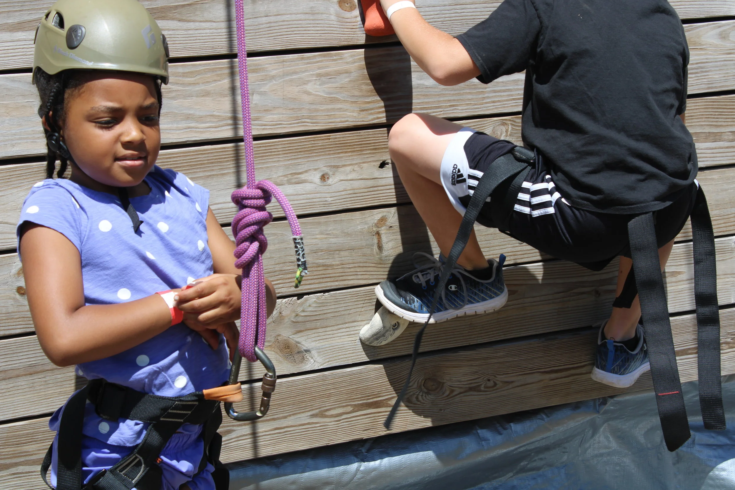 tower girl with helmet ropes.jpeg