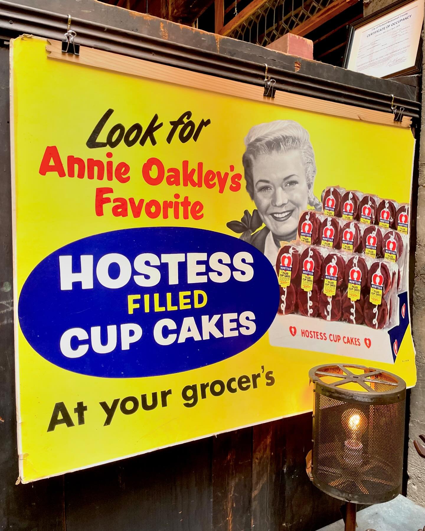You just never know who's gonna come waltzin'  through the front door!
Today, it was Annie Oakley (circa 1955), touting her favorite Hostess Filled Cupcakes!
🧁
32&quot; x 44&quot; on waxed poster board. 70 years of wear to the corners. Local pickup 