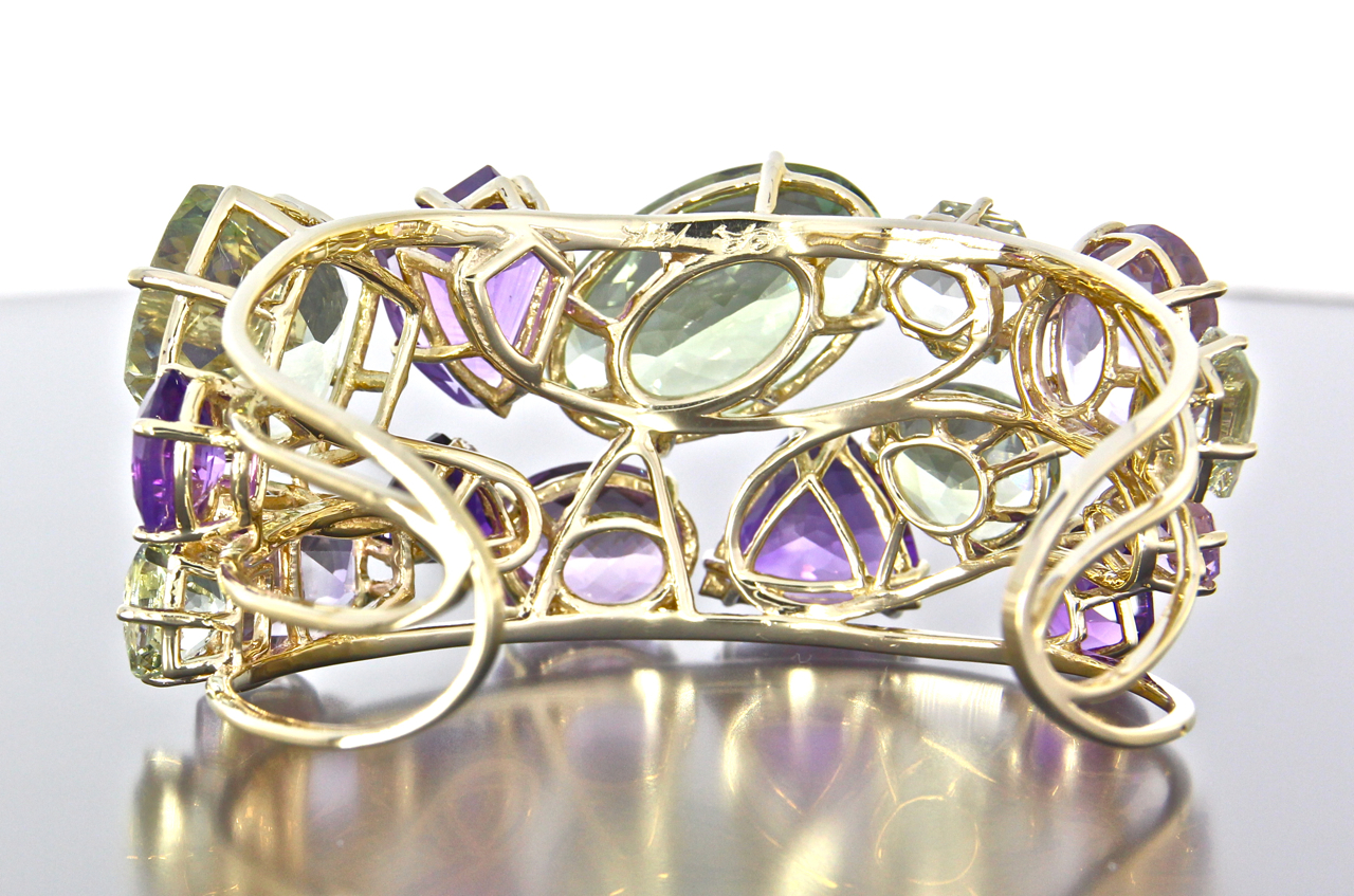 Beautiful filigree work on all custom cut gemstones
