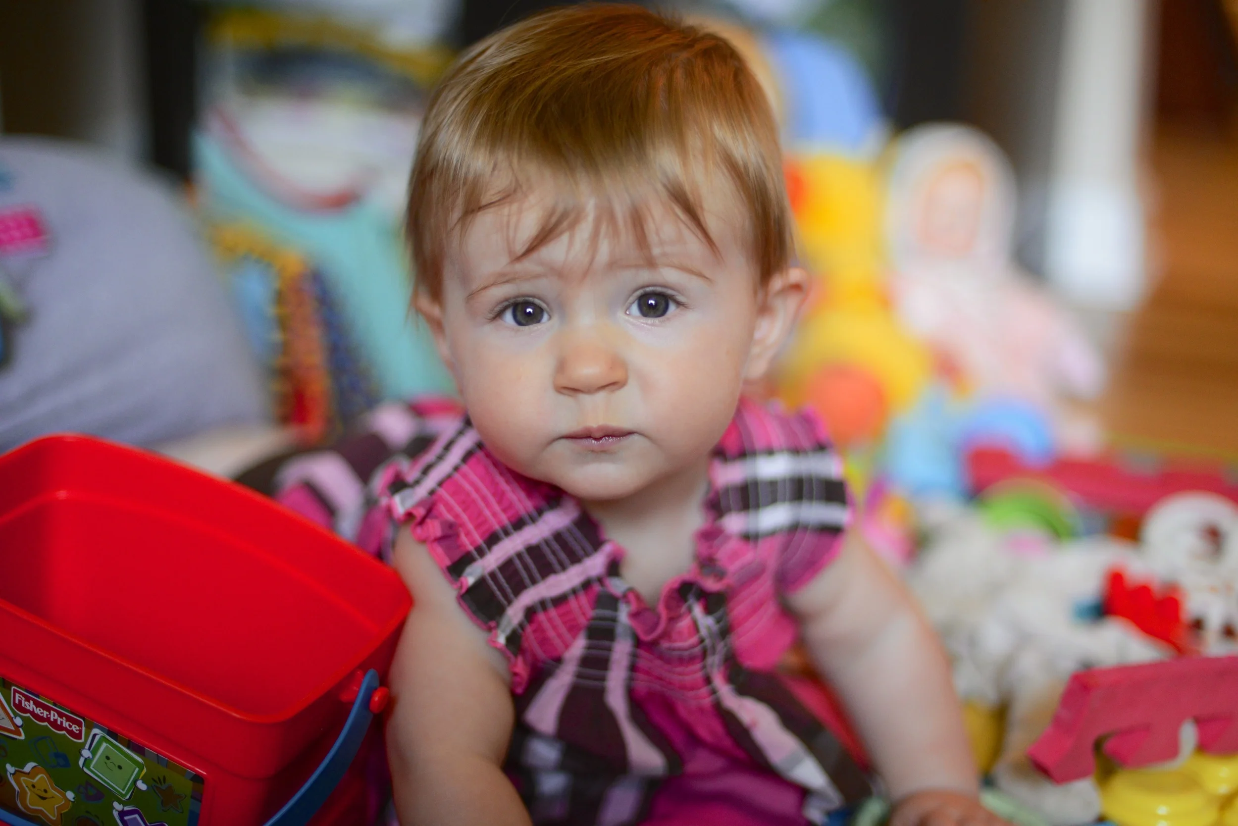 This little girl is trying her hardest to crawl. She's getting there!