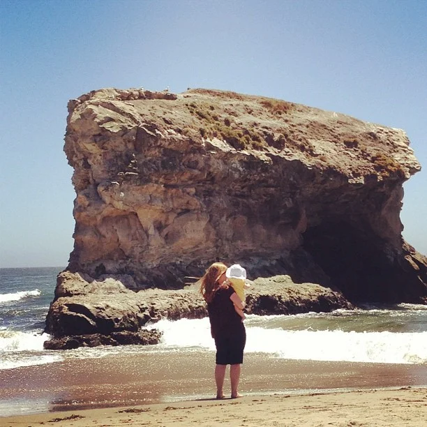 Lila's first visit to the Pacific (at Natural Bridges Beach in Santa Cruz)