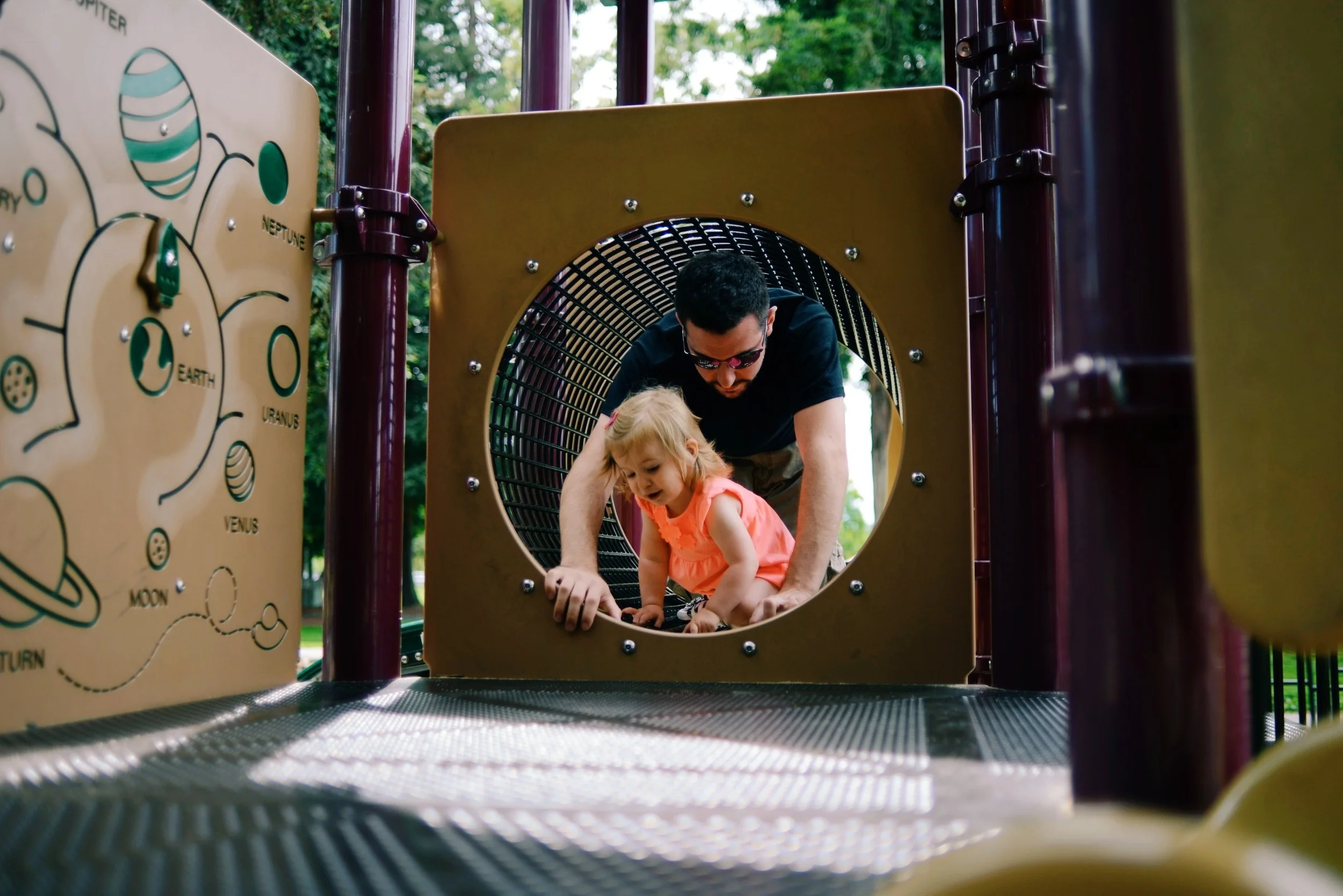 On the playground with Dad.