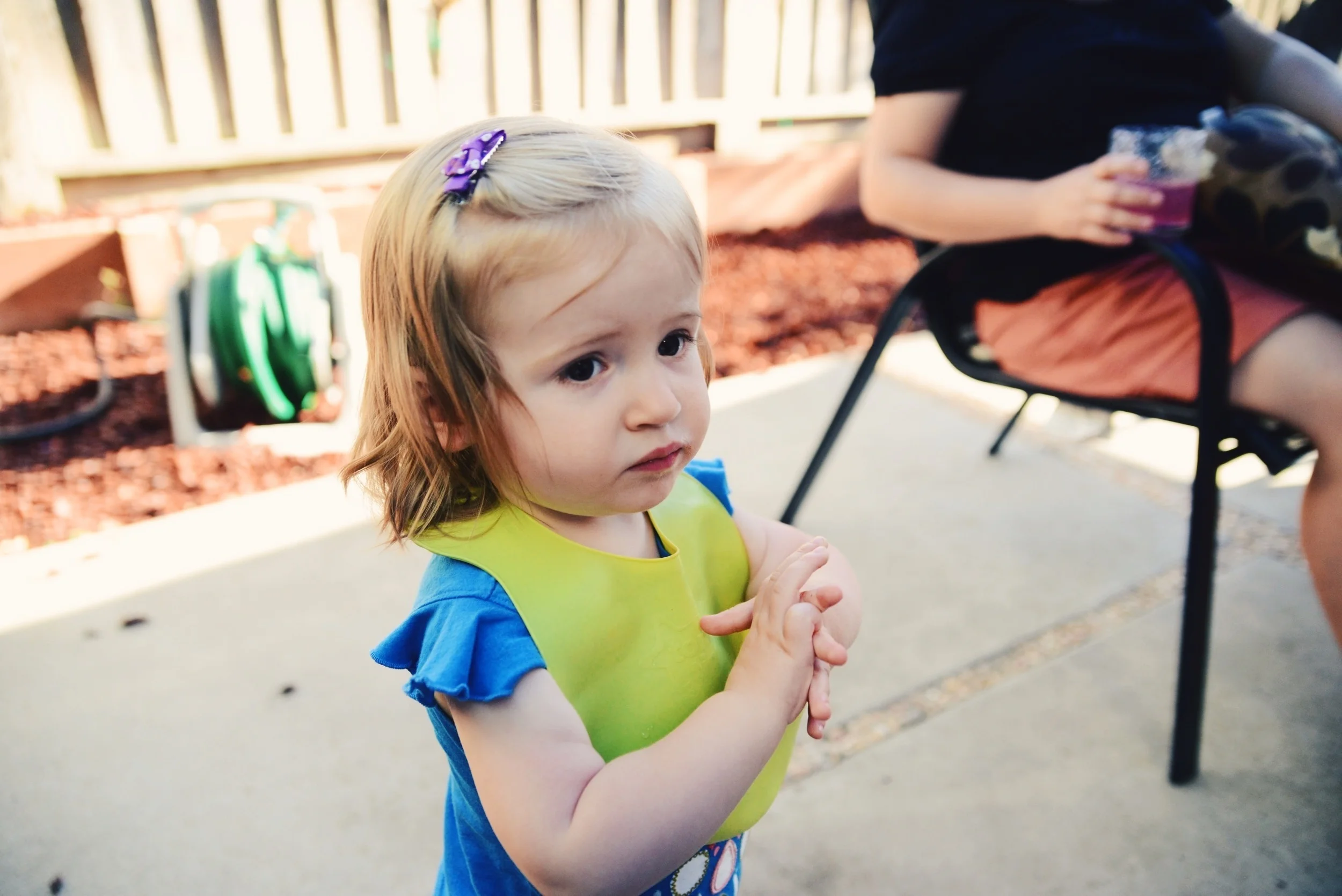 Looking concerned.