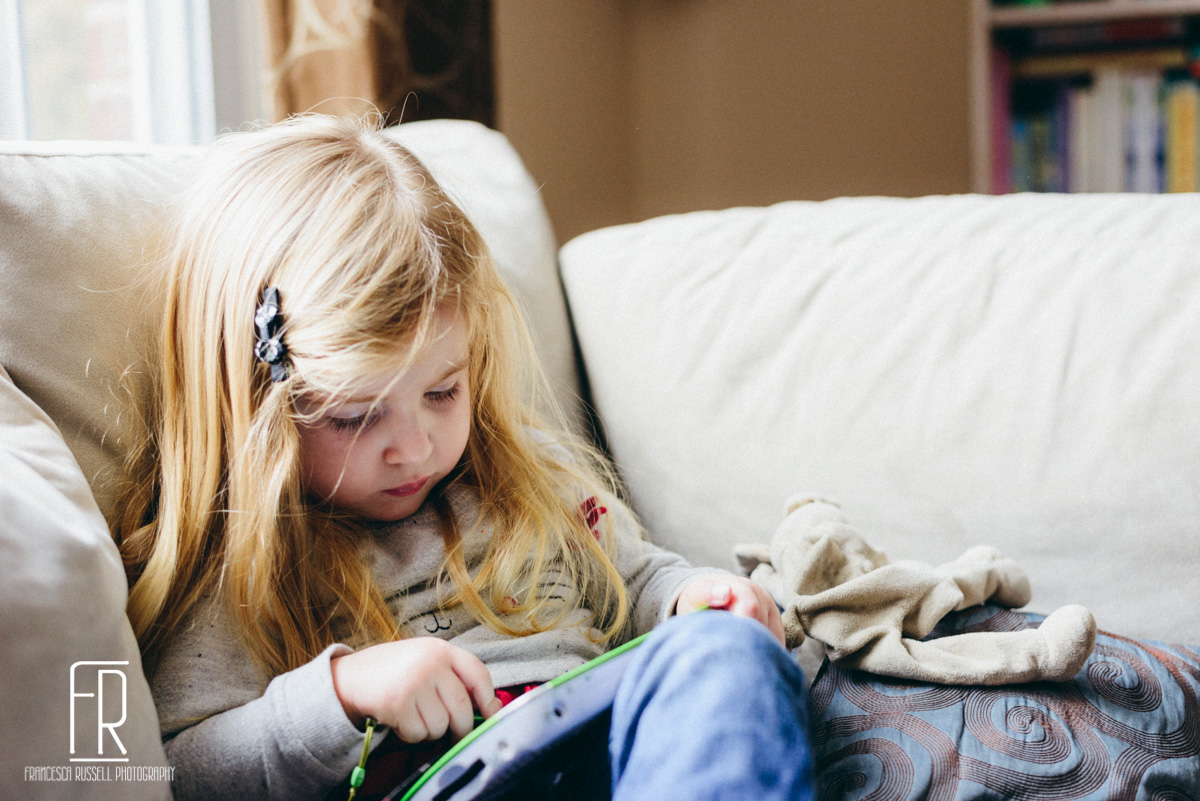 Playing with her LeapPad.