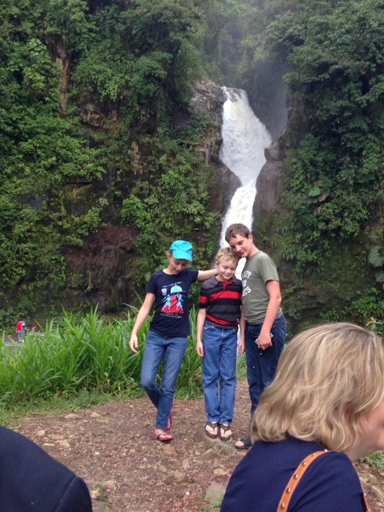 Kids hamming it up near the waterfall