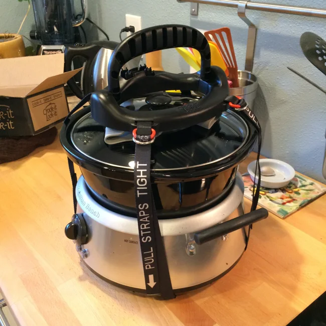 Even with the unique design of my crock pot, attaching the Crock-it Lock-it and securing it was simple and easy. Straps are clearly marked with basic directions in case you misplace the original packaging.