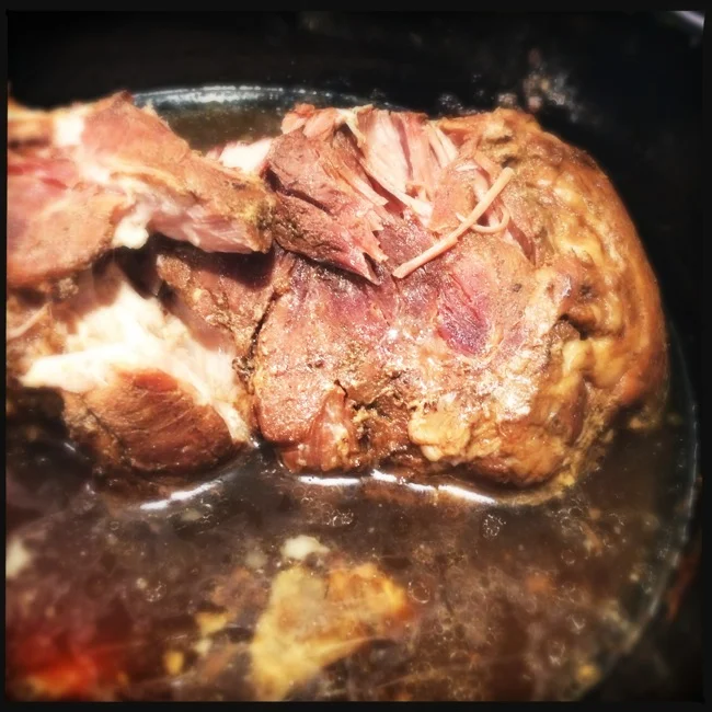 Kahlua Pork after 12 hours in the crock pot. Notice all of those juices that have cooked out of the roast and are working to keep it moist throughout the cooking process.