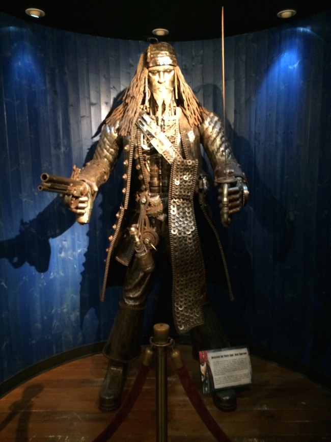 This 8 foot tall statue of Capt. Jack sparrow from Pirates of the Caribbean is made of recycled car parts!