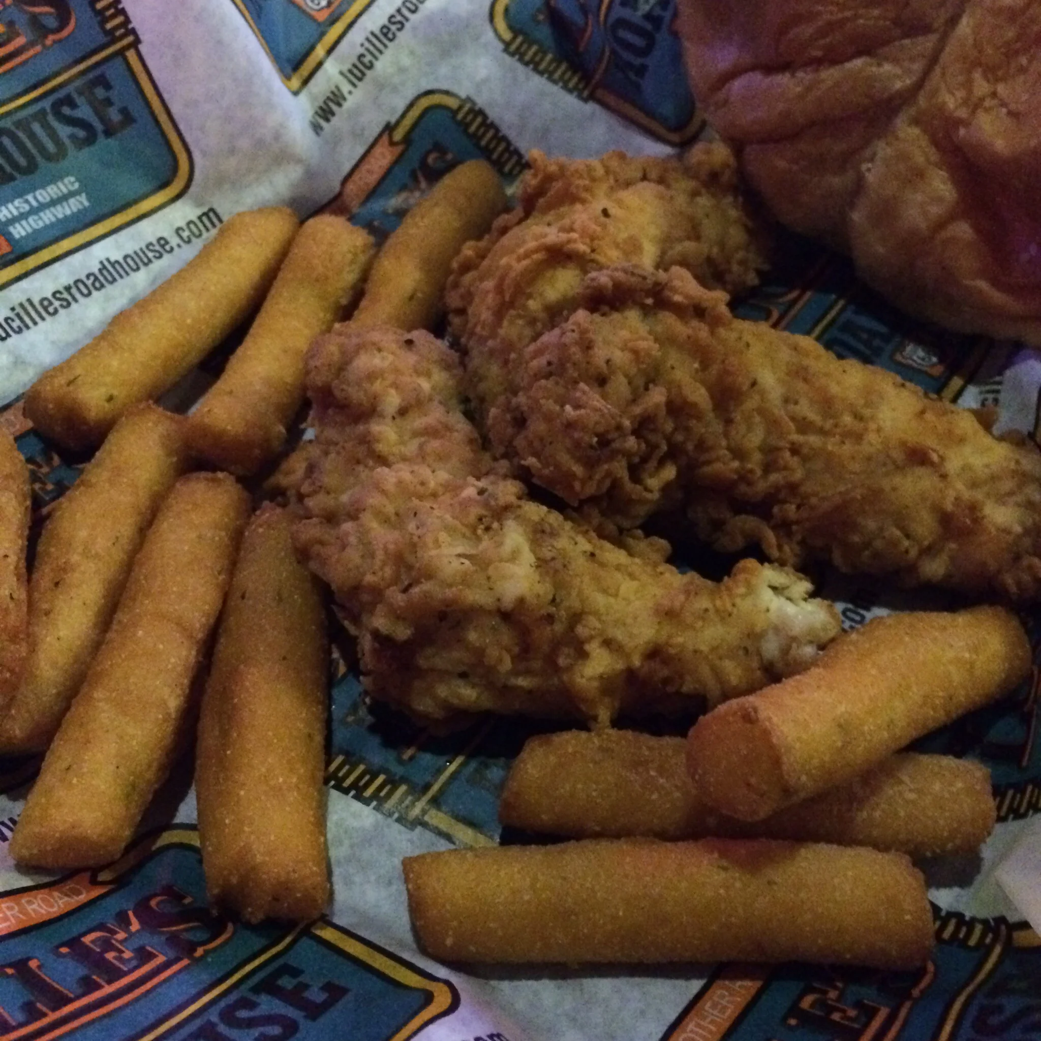 The half order of chicken fingers with hush puppies was 3 large pieces of chicken and 12 hush puppies. A full meal anywhere but the Oklahoma\Texas area.