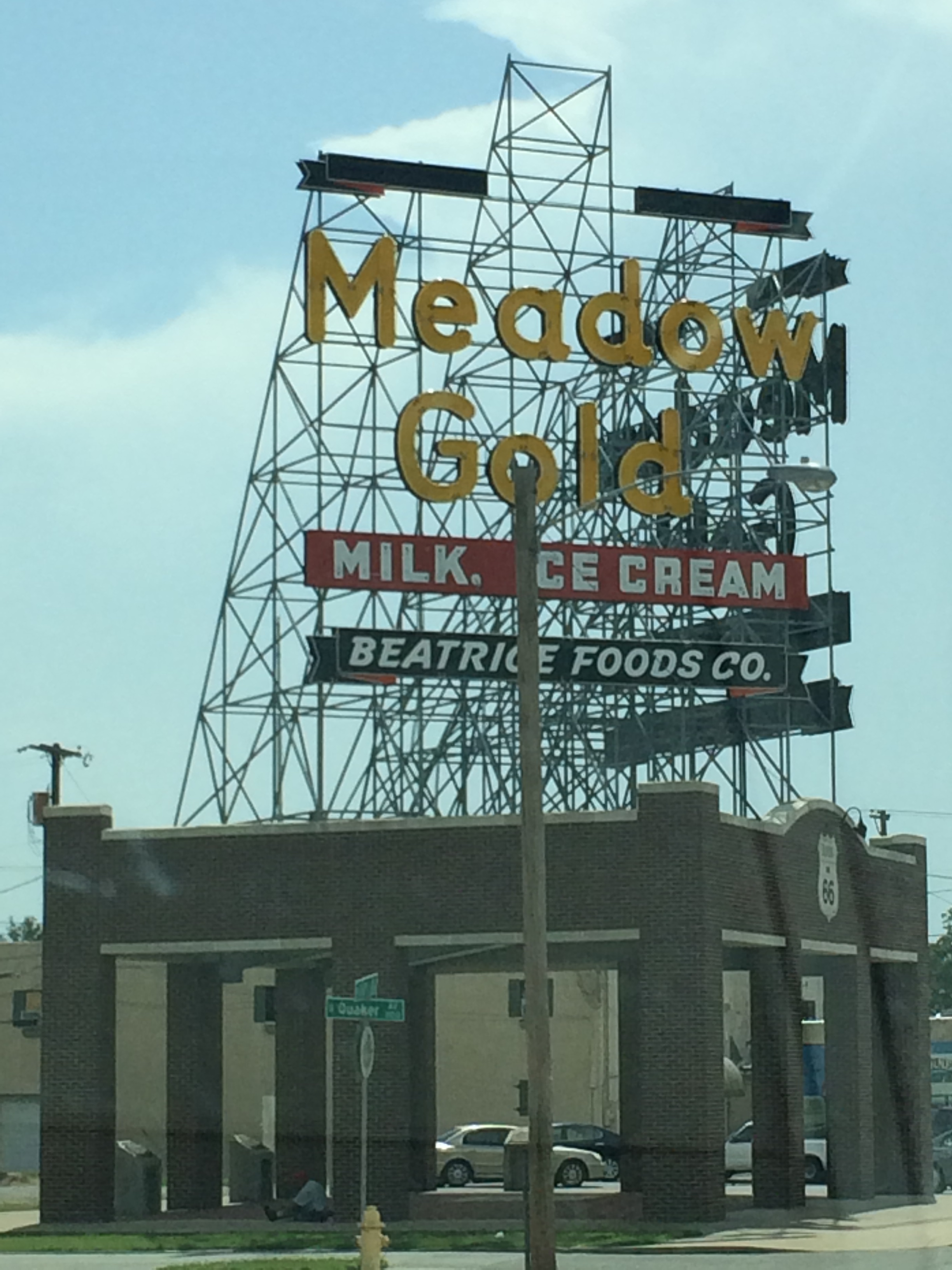 The Meadow Gold dairy goods sign in Tulsa now sits atop a pavilion with historical markers talking about the importance of the dairy to Tulsa instead of any of the remaining buildings from the plant.