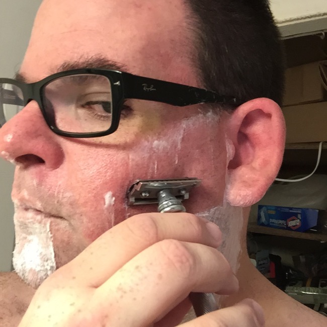 Step Six: Put razor to face! Start with handle parallel to floor and then slightly drop end down until the blade just starts to grab hair. Apply as little pressure as possible, letting the razor do the work unlike disposable razors. Make sure you shave with the grain of your beard to avoid ingrown hairs.