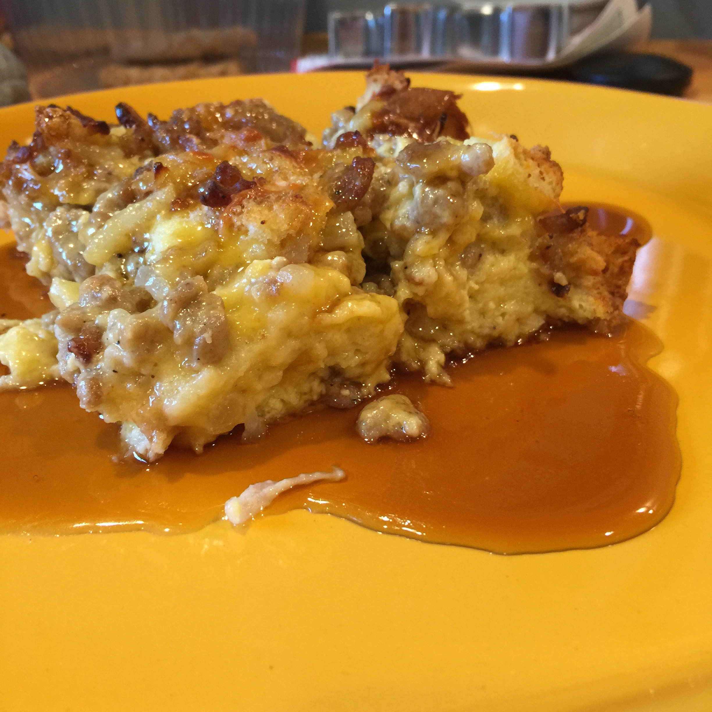 Sweet and Savory bread pudding topped with old fashioned maple syrup....a radical new twist that tasted like my childhood......