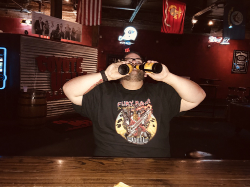 This fat boy drinks them both and hopes his boy comes back before the next round hits the bar....