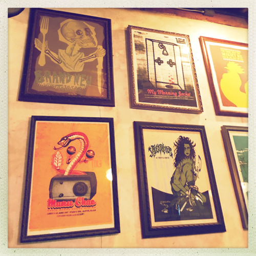 Stubbs BBQ has quickly become one of the premiere music venues in Austin, and they proudly have decorated with concert posters from previous shows.