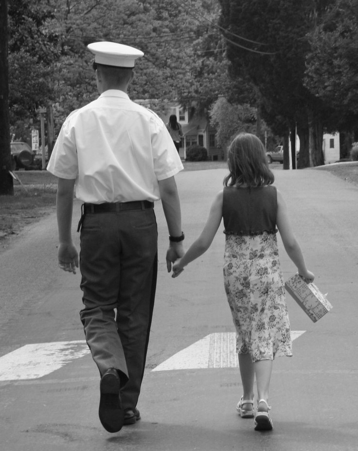 This picture was taken on Mother’s Day, 2008. We had gone to visit Christopher at school and as he was walking us to the car to leave, my daughter grabbed his hand and held it as they walked away together. Exactly one year later, Mother’s Day, 2009, Christopher passed away unexpectedly. This sweet picture of everyday life is now one of my favorites. I can’t remember why she had a box of tissues in her hand but now, it is a perfect fit for this photo.
