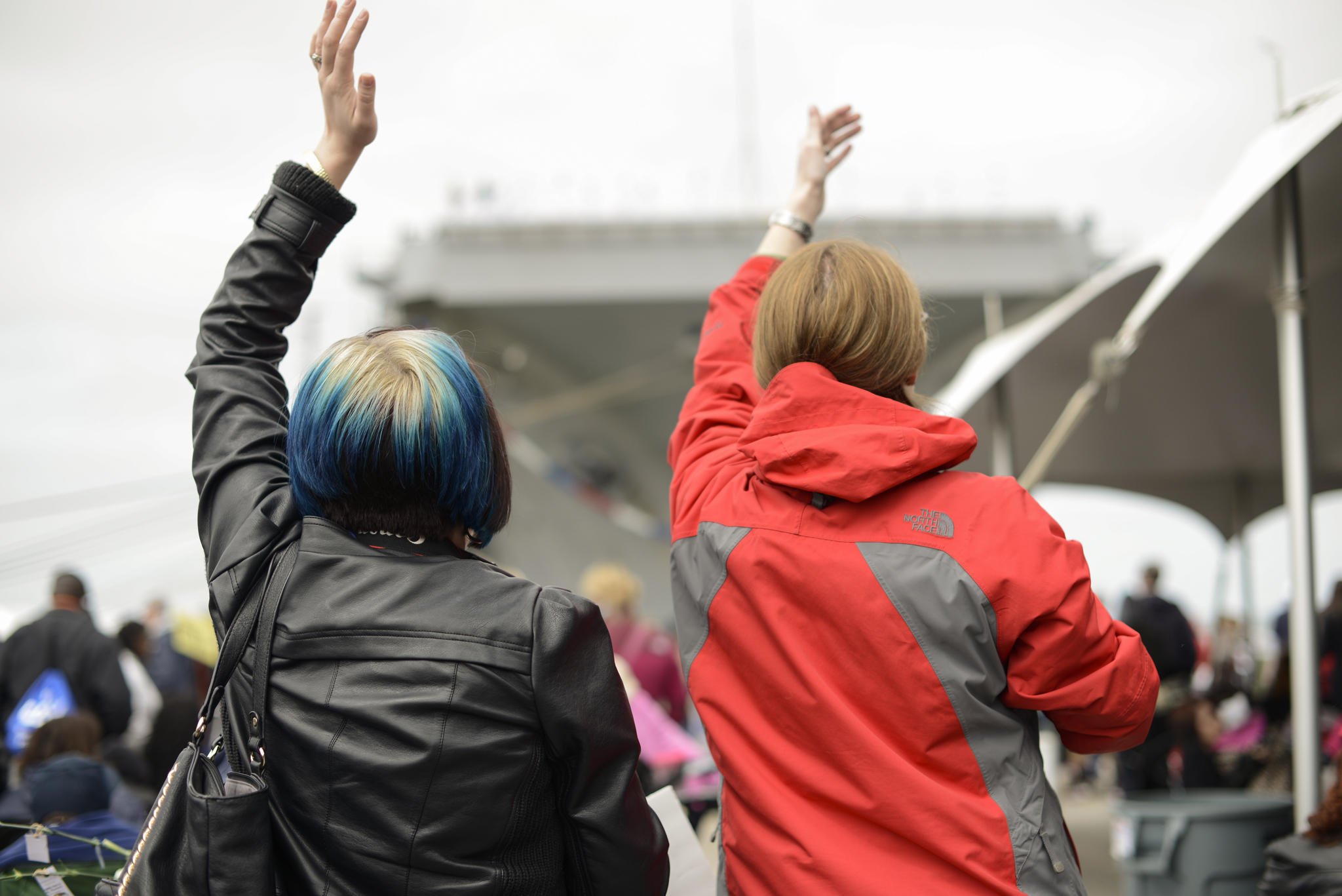 Wives waving at their men | USS Truman naval military homecoming | Maria Grace Photography