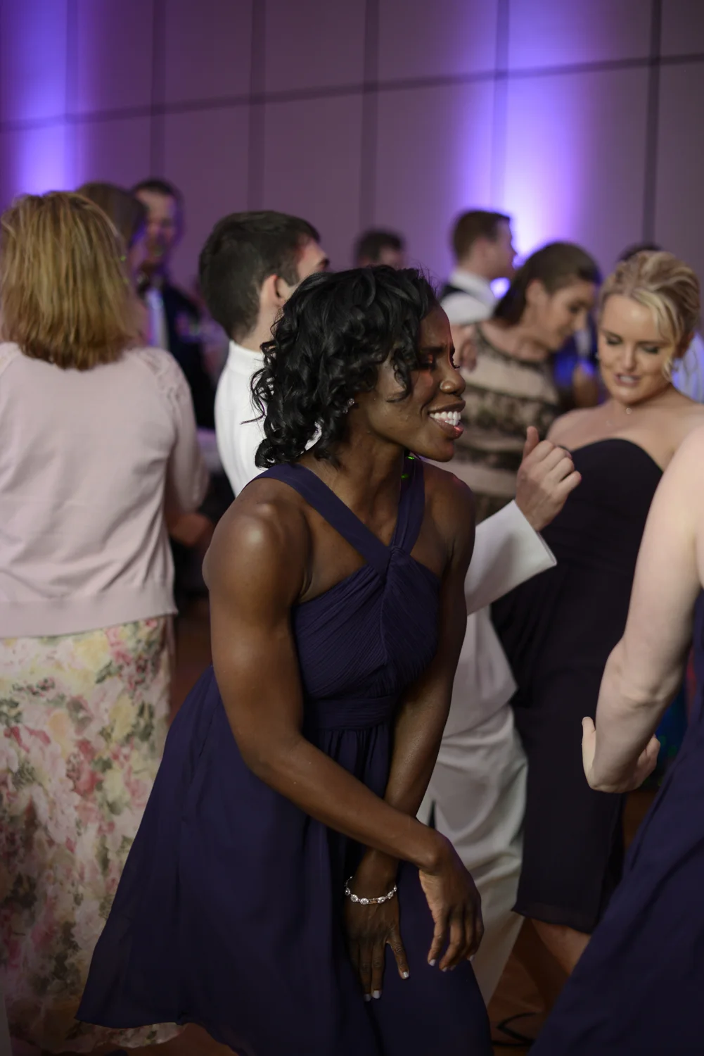 Dancing wedding guests at the reception | Maria Grace Photography