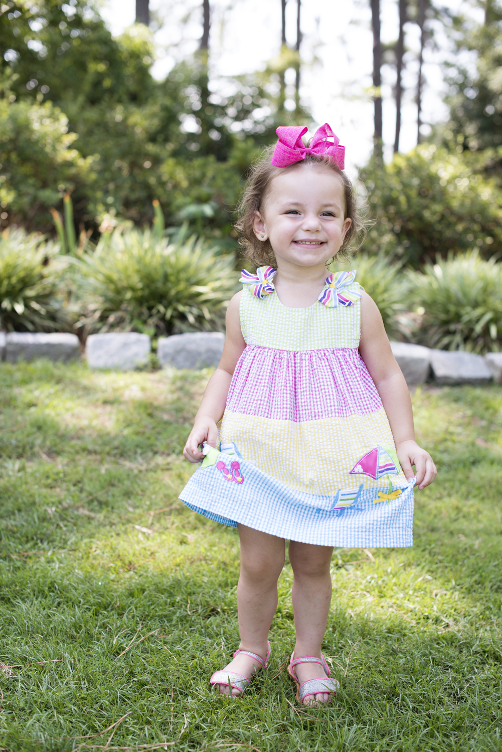 Adorable little girl in a sundress at family portraits in Portsmouth, Virginia