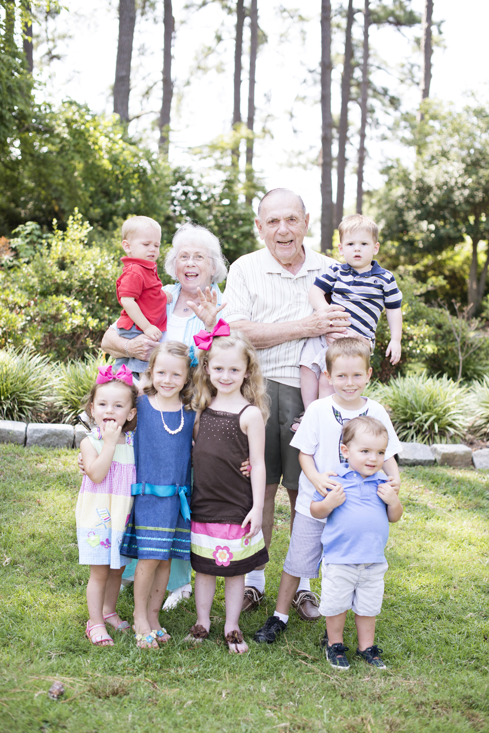 Great grandparents with all their grandchildren at family portraits in Portsmouth, Virginia