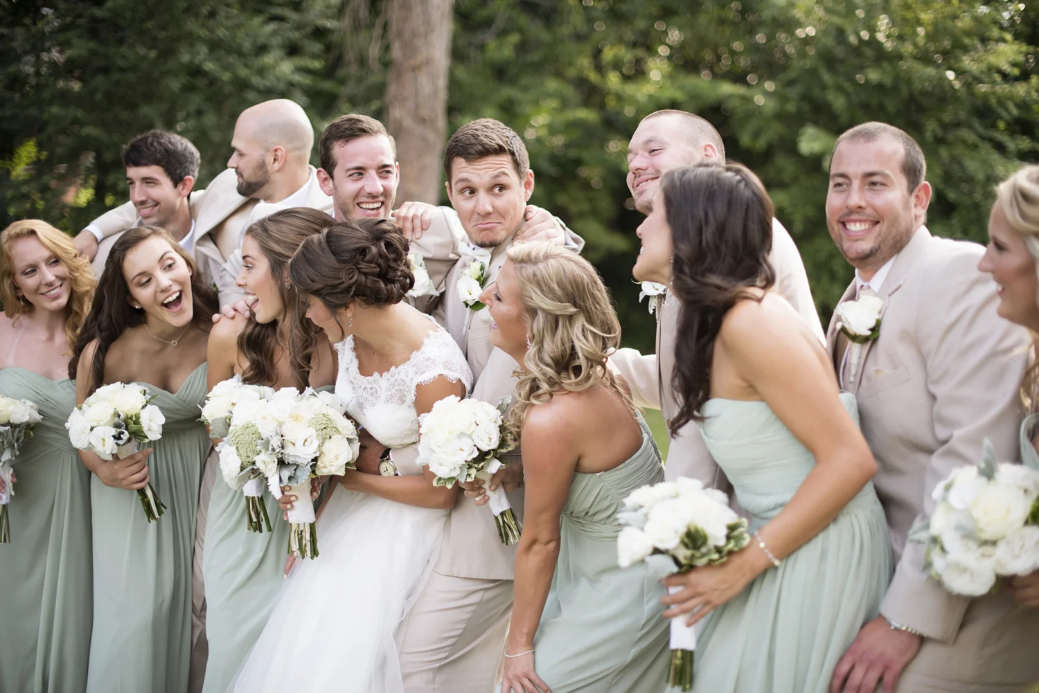 Bridal party pictures in mint green dresses and cream white tuxedos | Portsmouth Woman's Club in Virginia