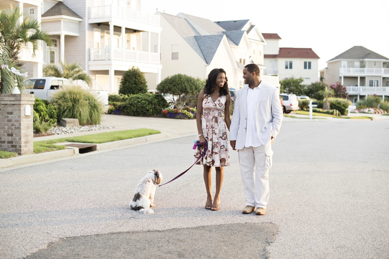 Sunrise engagement portraits on a neighborhood street in East Beach in Norfolk, Virginia