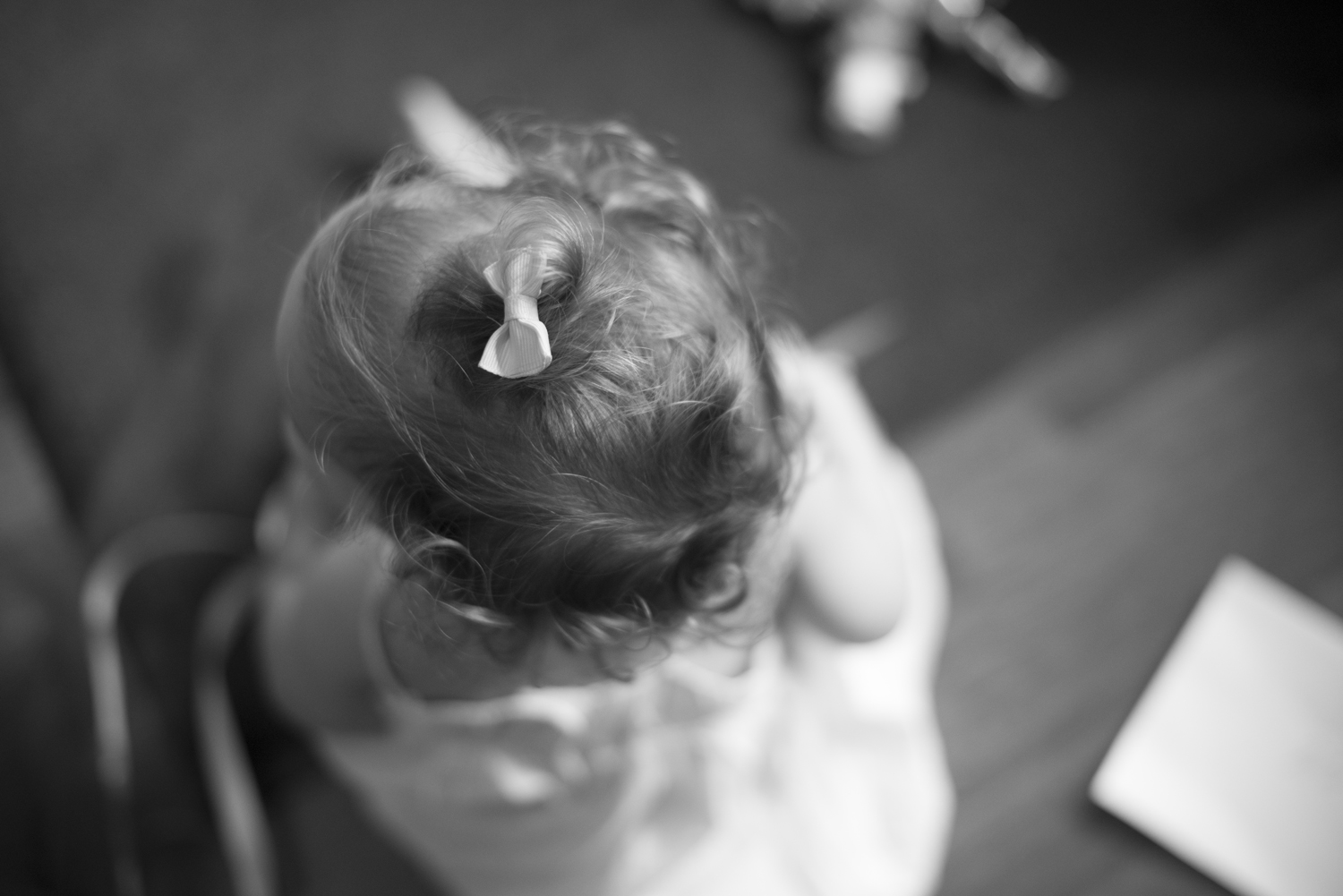 Baby with bow on her head (black and white)