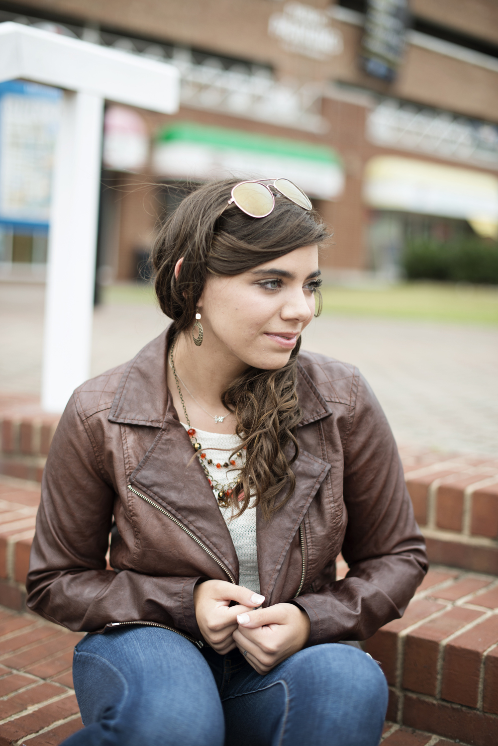 Downtown Virginia senior portraits | leather jacket and sunglasses