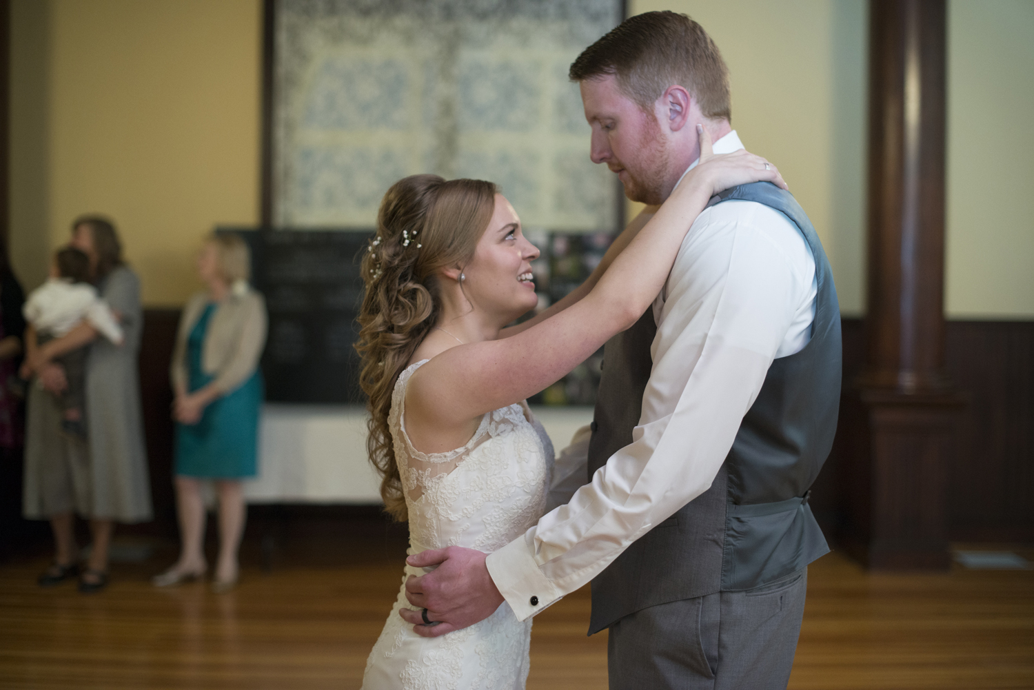 Bride and groom's first dance together at an indoor reception