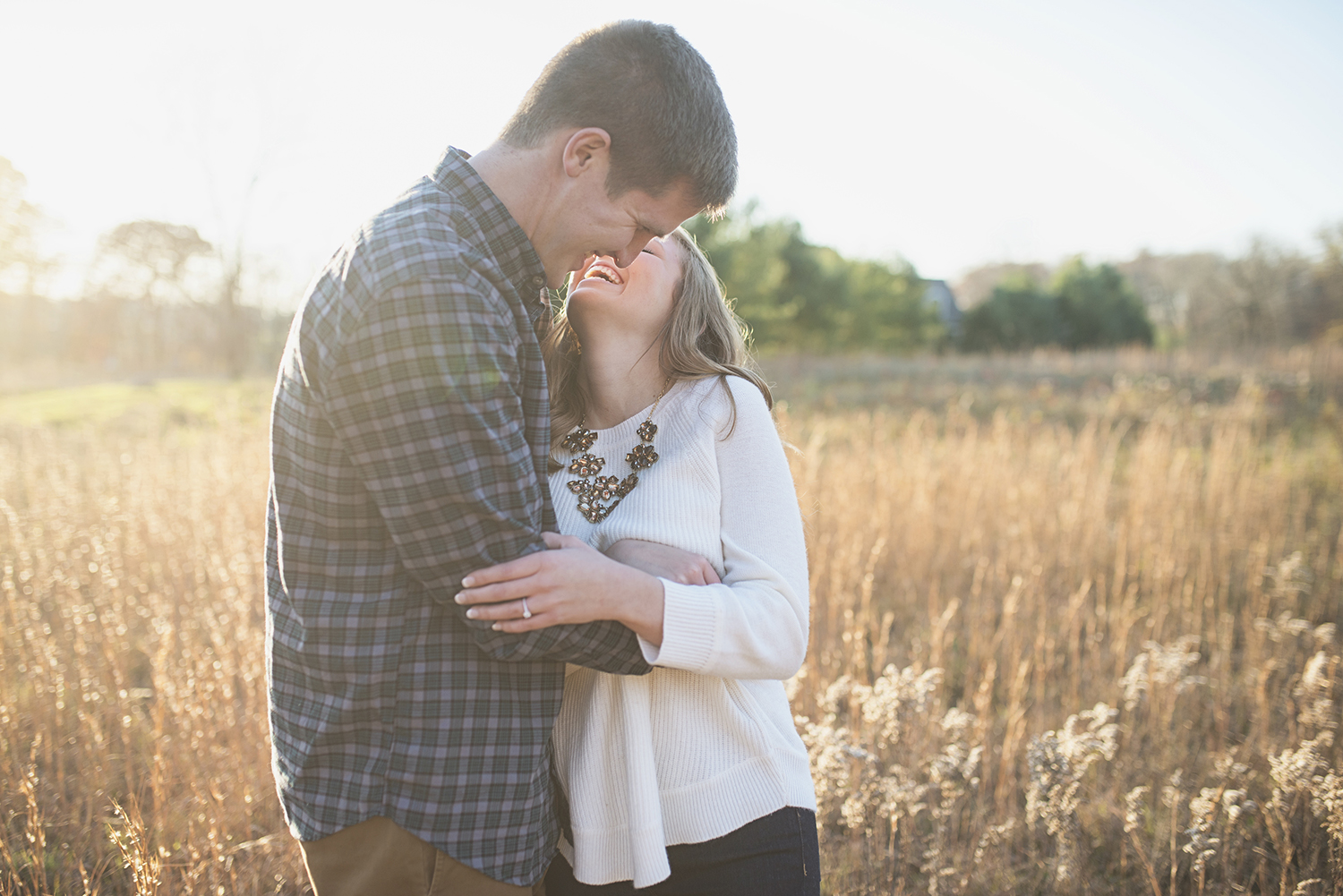 Destination Northern Virginia Engagement Session | Casual J Crew engagement pictures in field with golden light