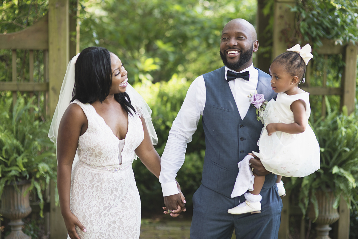 Elegant Lavender Plantation Elopement | Bride and groom with daughter
