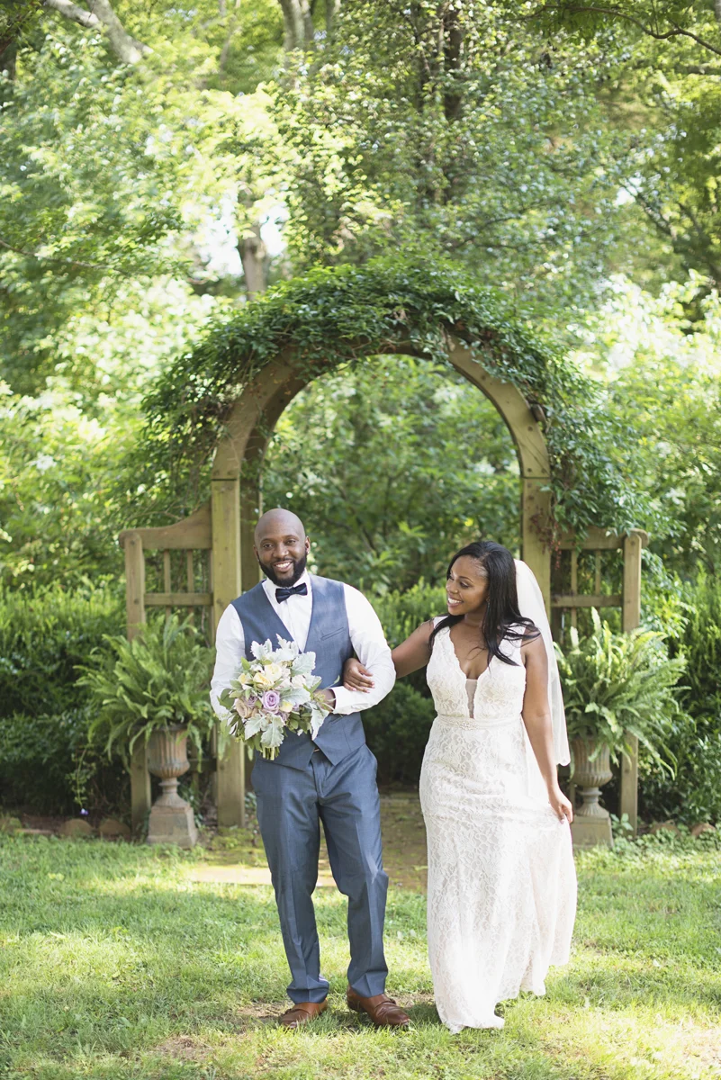 Elegant Lavender Plantation Elopement | Bride and groom walking portraits