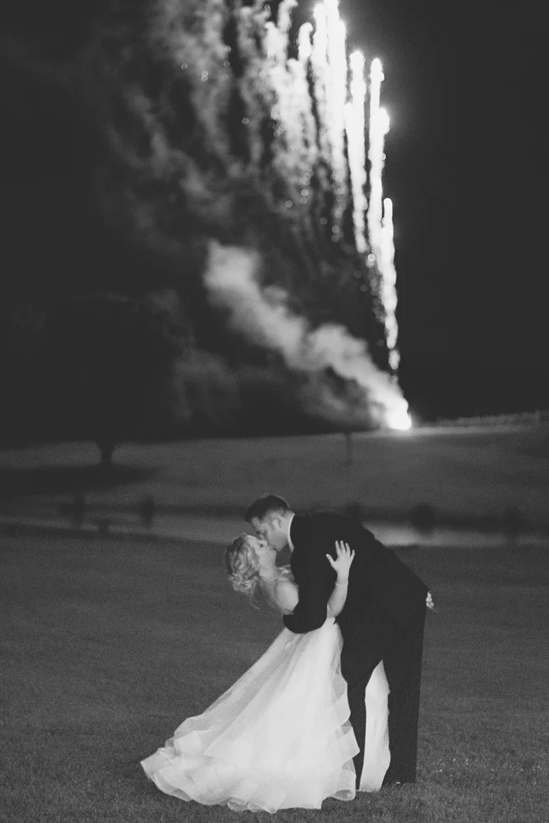 BrAlbemarle Estate at Trump Winery Wedding | Bride and Groom Fireworks Kiss