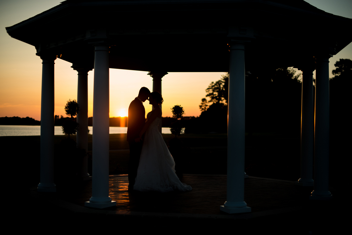 Emerald Green Classic Country Club Wedding | Bride and Groom Sunset Silhouette Portrait