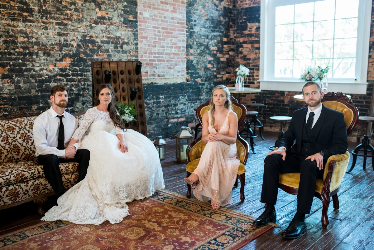 Elegant and Intimate Winery Wedding | Bridal party portrait with vintage rentals
