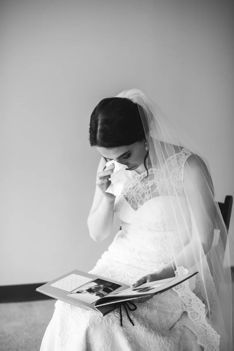 James Monroe Highland Wedding in Charlottesville | Bride reading letter